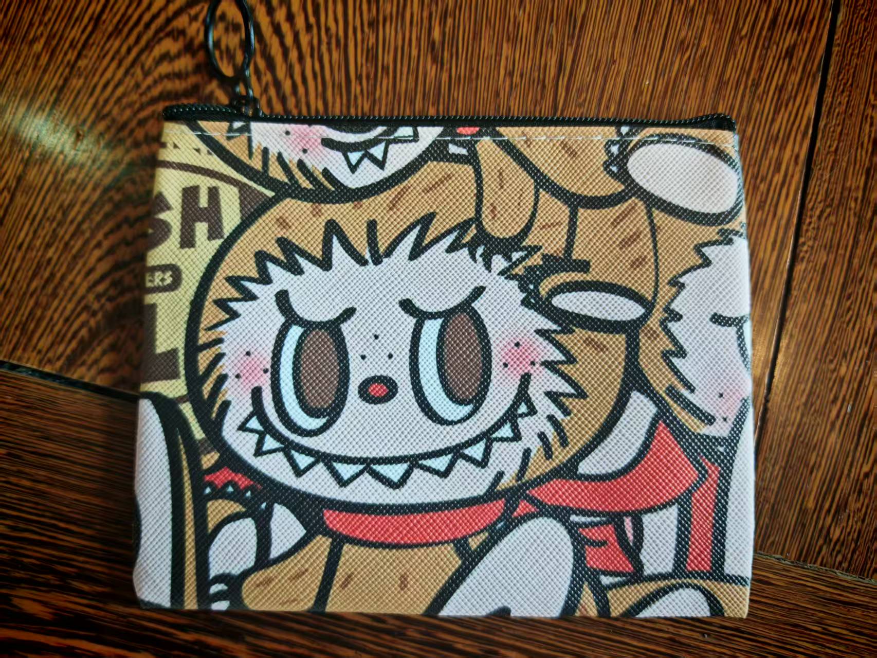 The new labubu cartoon and cute coin purse